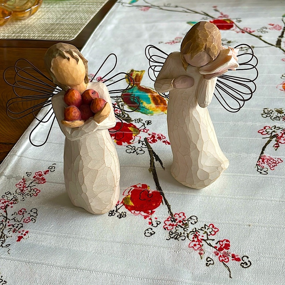 Two willow tree figurines